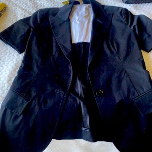 Black, short sleeve office jacket.